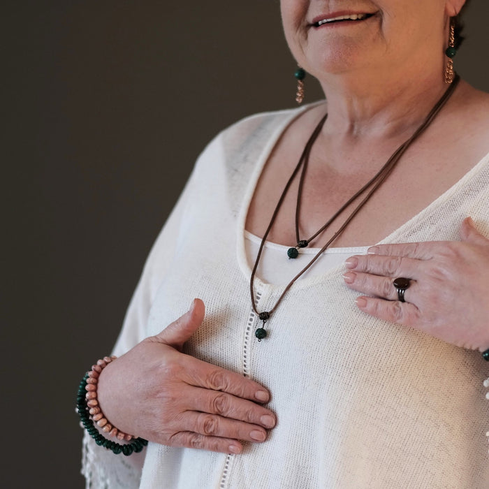 model wearing malachite necklace