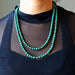 model wearing double strand malachite necklace