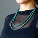 model wearing double strand malachite necklace