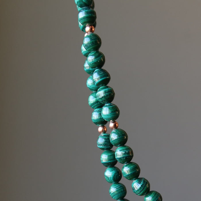 model wearing double strand malachite necklace