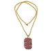 A rectangular marble pendant wrapped in gold-tone wire and attached to a satin-coated nylon twist cord necklace.