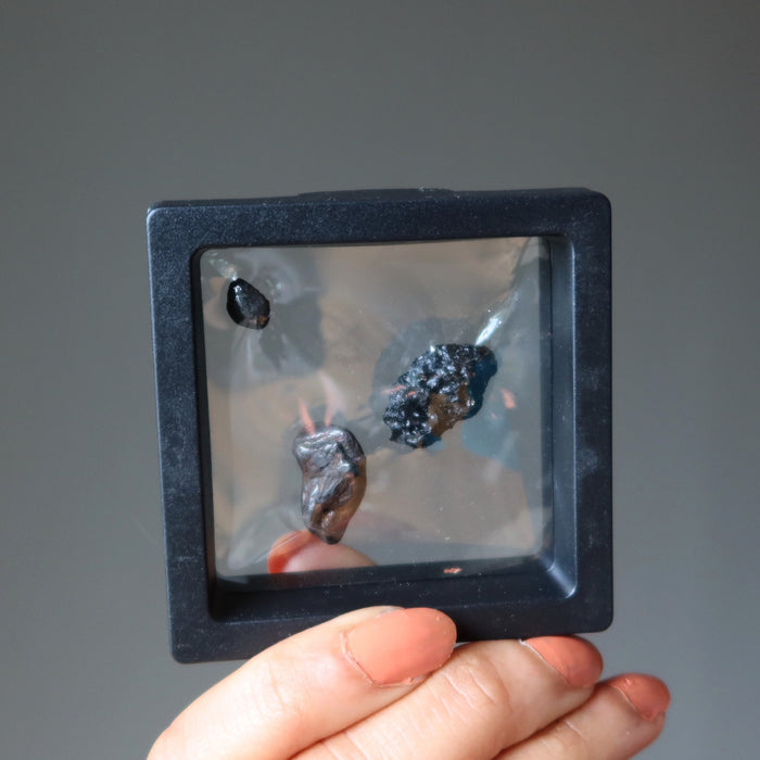 Real Meteorite set by Satin Crystals includes black tektite, chelyabinsk and agoudal space rocks in suspension case