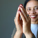 sheila of satin crystals wearing moldavite faceted ring on her fingers