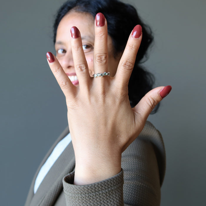 sheila of satin crystals wearing moldavite ring