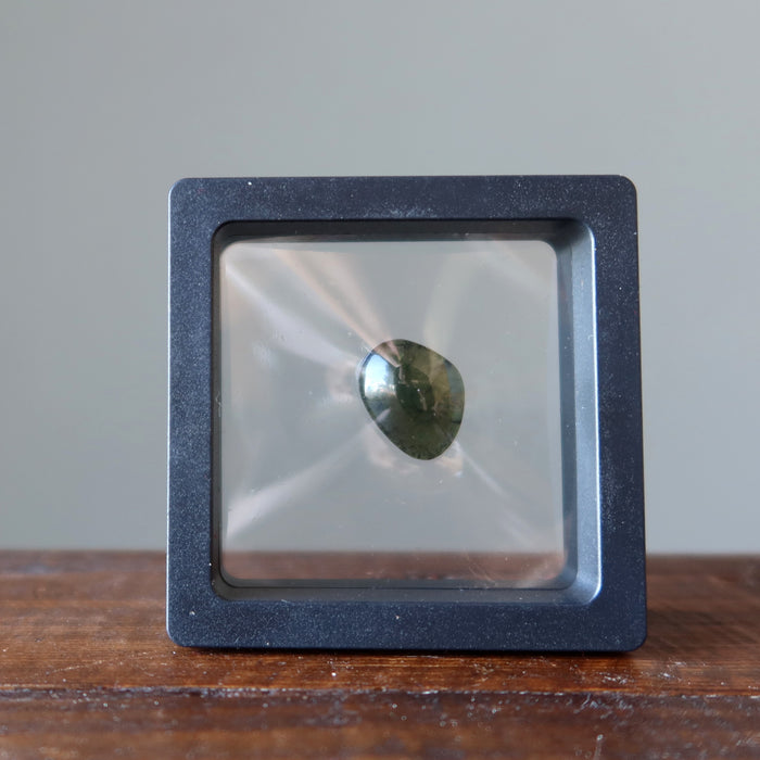 real moldavite stone in suspension case