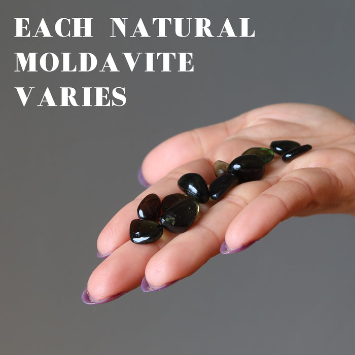 hand full of moldavite showing each is unique