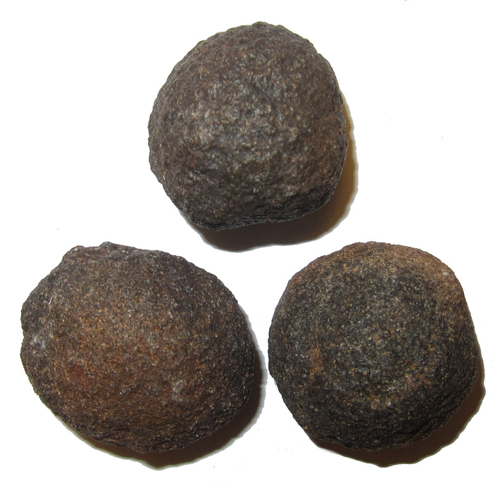 three brown moqui marble stones