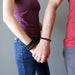 female and male models wearing Black Obsidian Bracelets 