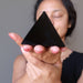 sheila of satin crystals meditating with black obsidian pyramid
