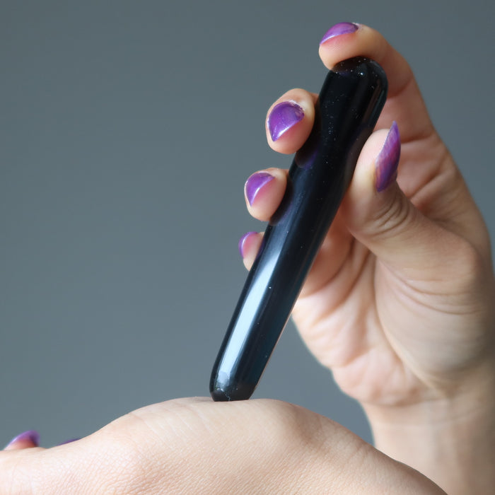 model showing how to massage on the hand