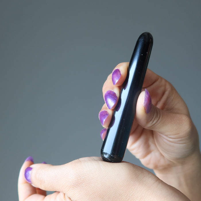 model showing how to massage on the hand