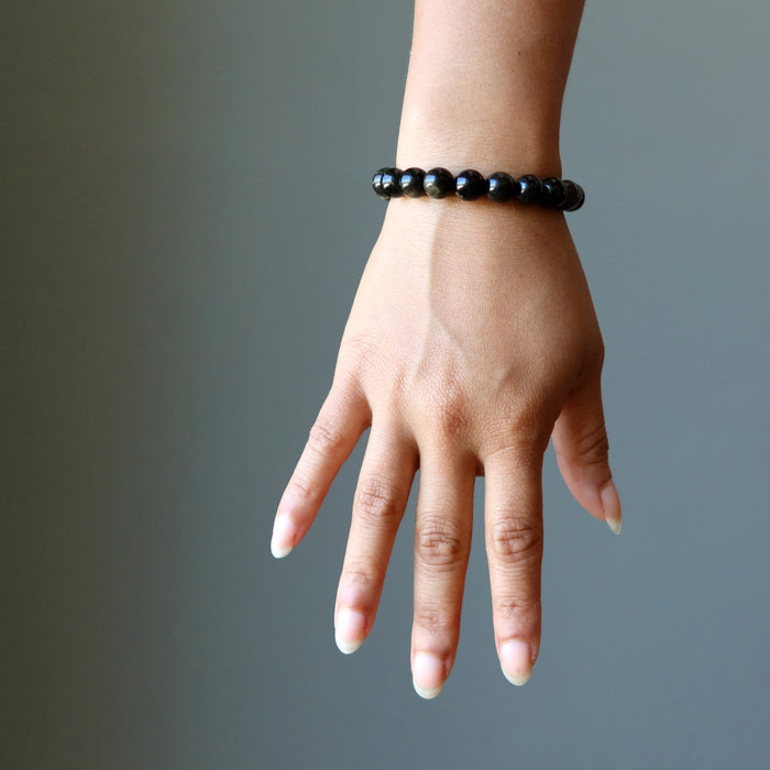 model wearing Gold Sheen Obsidian Bracelet