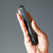 hand holding Faceted Gold Sheen Obsidian Wand