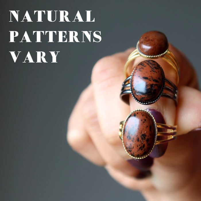 three mahogany obsidian gold rings showing natural patterns vary