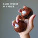 mahogany obsidian spheres in hand