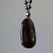 obsidian kwan yin necklace