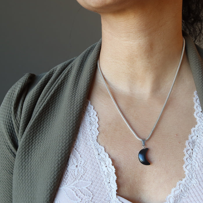female model wearing Crescent Moon Black Obsidian Pendant 
