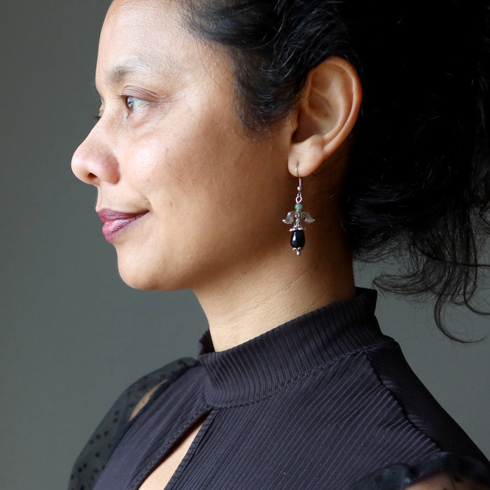 sheila of satin crystals wearing onyx earrings