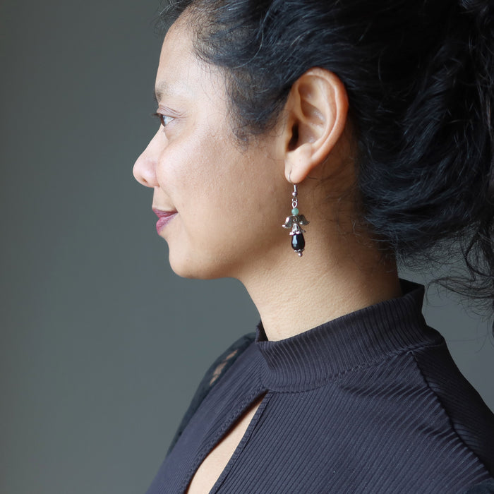 sheila of satin crystals wearing onyx earrings