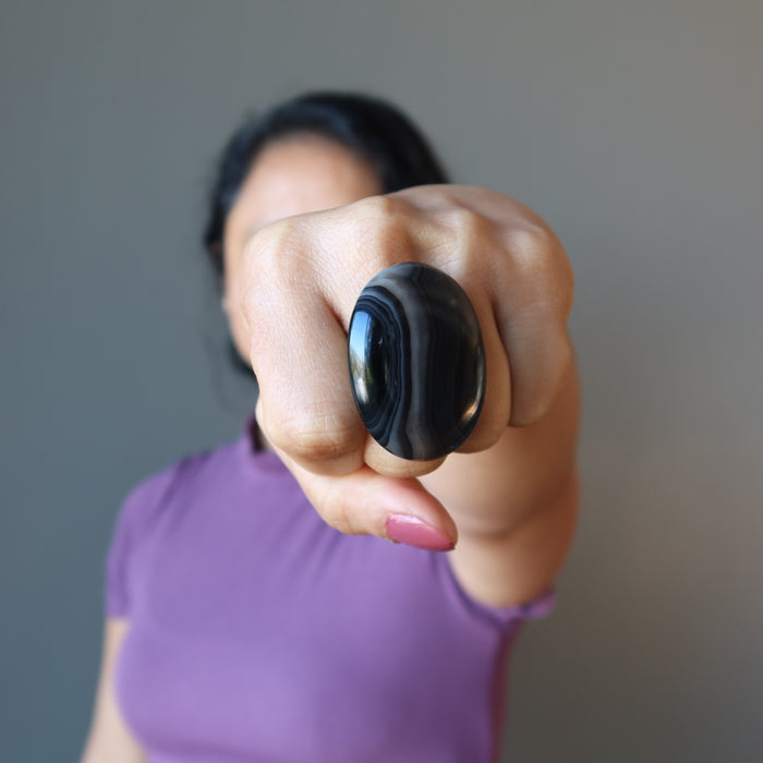 woman wearing black onyx ring