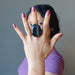 woman wearing black onyx ring