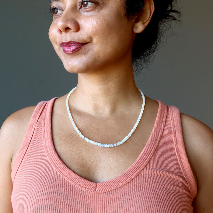 woman wearing opal necklace