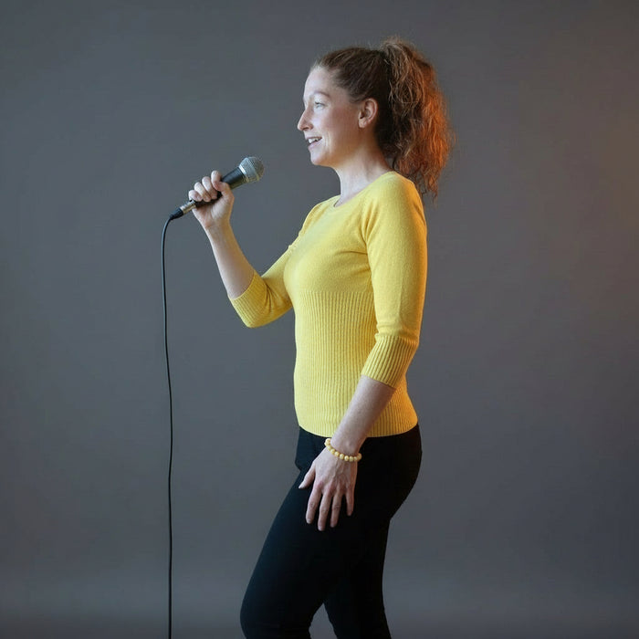 jamie of satin crystals wearing a round yellow opal beaded stretch bracelet