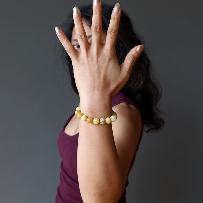 sheila of satin crystals wearing yellow opal beaded bracelet