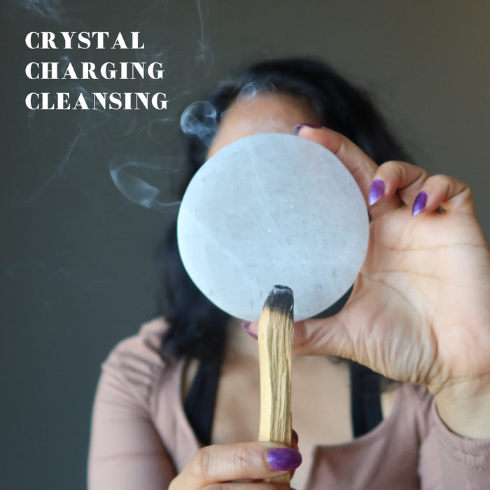 palo santo stick on selenite circle