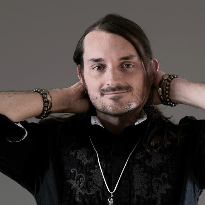 kendrick of satin crystals wearing 4 pyrite bracelets