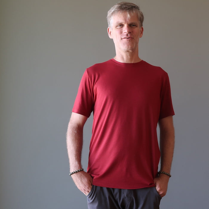 ryan of satin crystals wearing round pyrite beaded stretch bracelet on both wrists