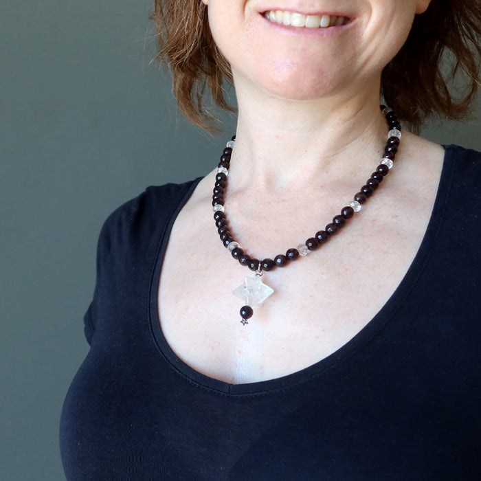 female model wearing clear quartz merkaba chalcedony necklace