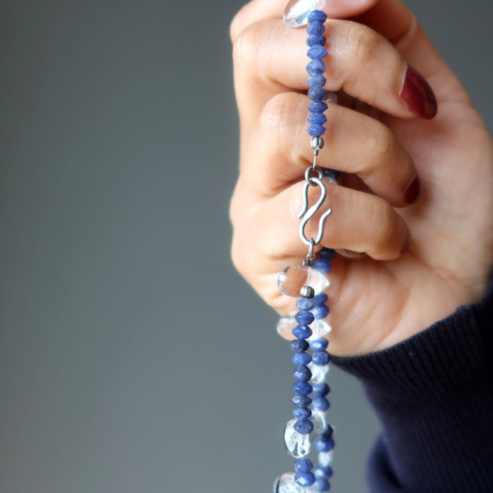 A clear quartz and blue aventurine necklace with a silver clasp.