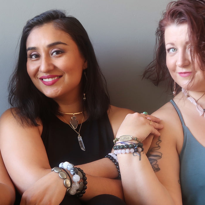 two female models wearing satin crystals jewelry