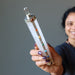 holding Clear Quartz Chakra Wand