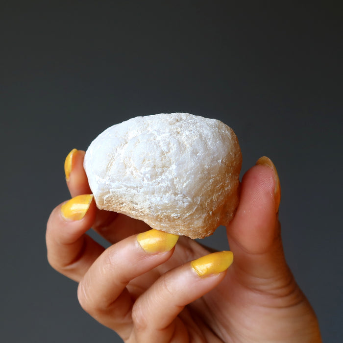 rock backside of rainbow aura quartz geode