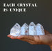 4 Rainbow Crackle Quartz Point Wand Towers on model palm showing each is unique