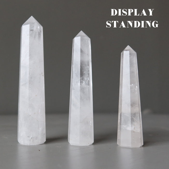 three faceted Cloud Quartz Wands standing