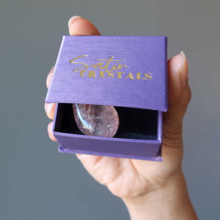 clear quartz with red fire inclusions in teardrop pendant in satin crystals purple gift box