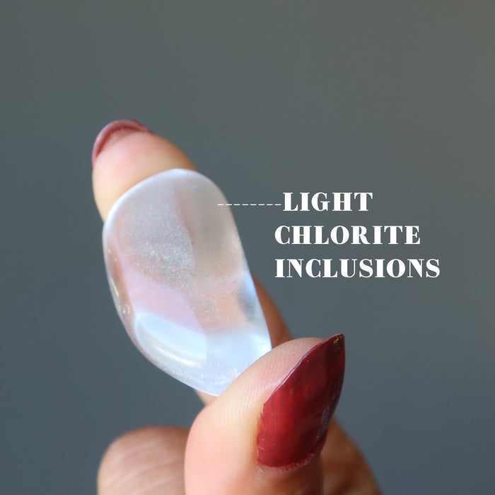 hand holding chlorite tumbled stone