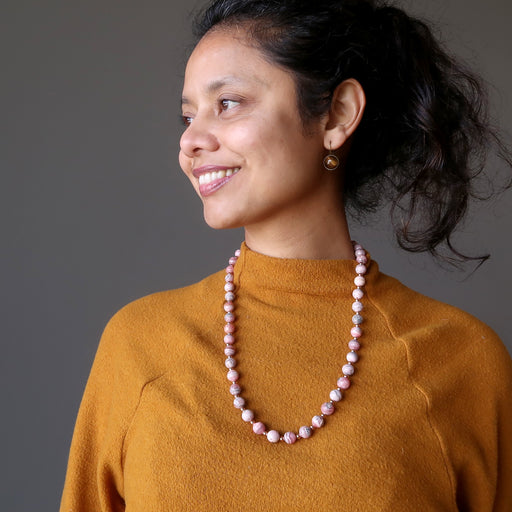sheila of satin crystals wearing rhodochrosite necklace