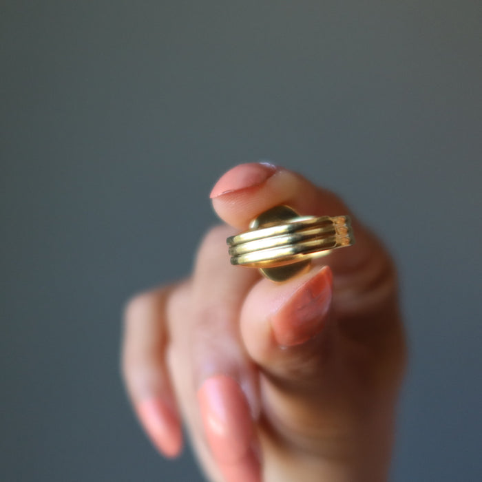 rhodochrosite oval in gold adjustable ring showing the back