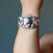 rhodonite sterling cuff bracelet on wrist
