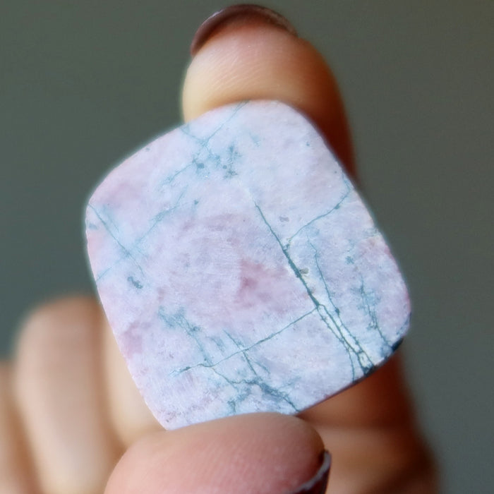 back of rhodonite cabochon