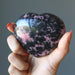 rhodonite heart in hand