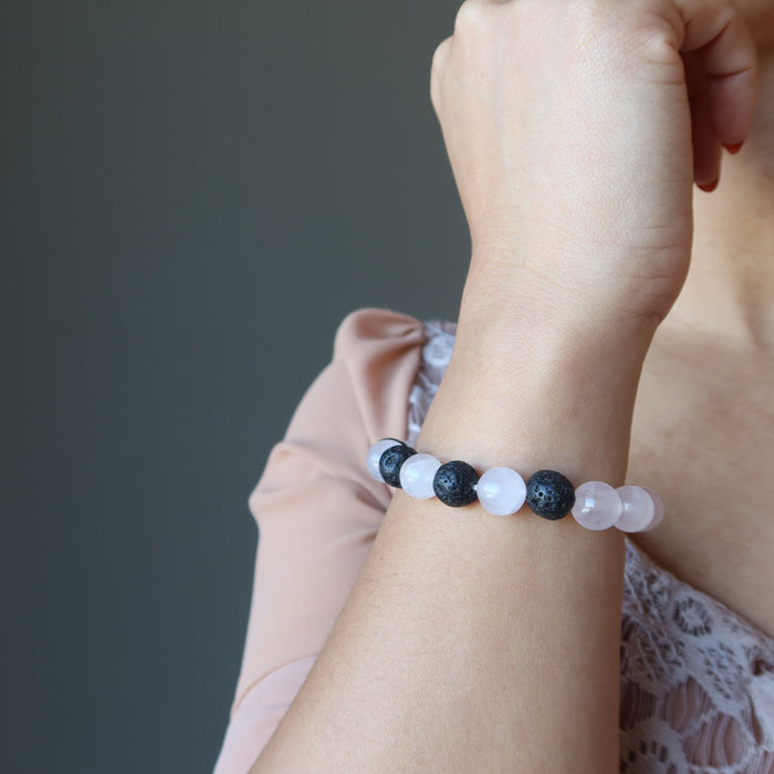 rose quartz lava bracelet on female wrist
