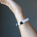 rose quartz lava bracelet on female wrist