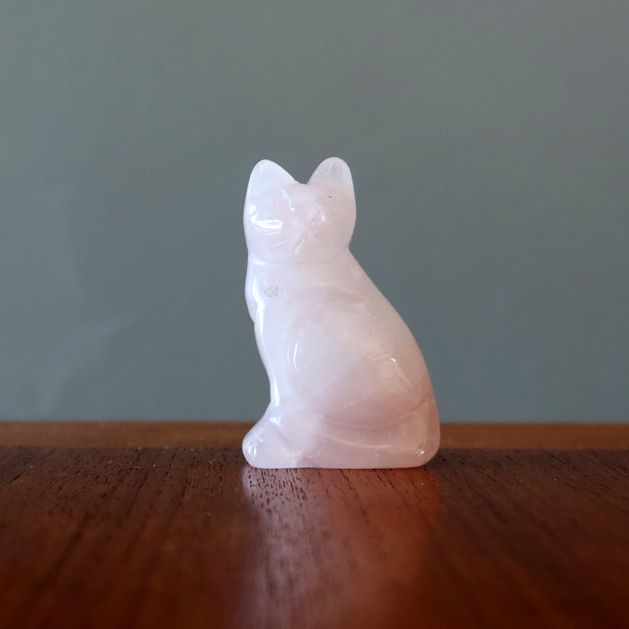 rose quartz cat on table