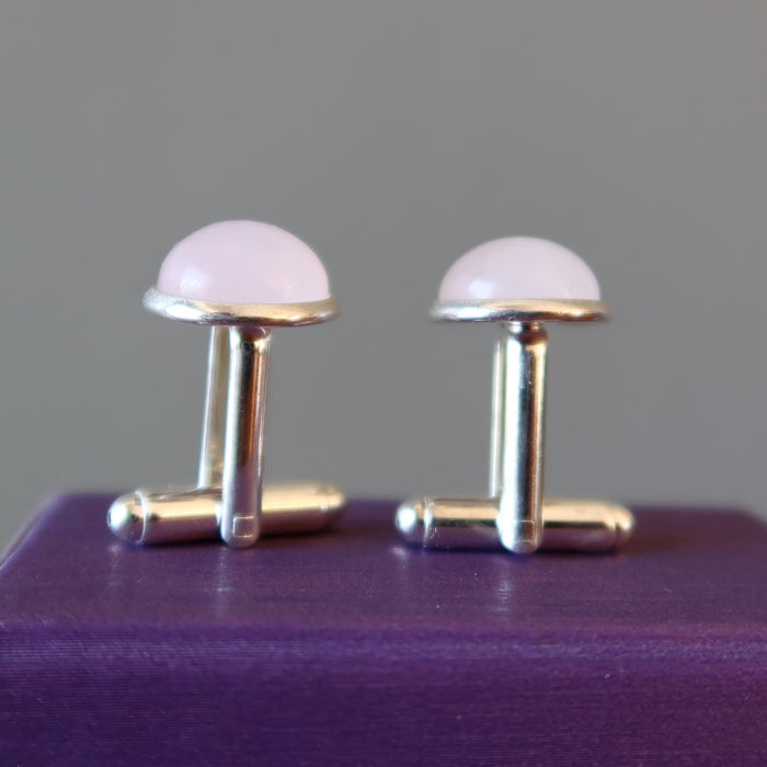 rose quartz silver cufflinks standing on purple box