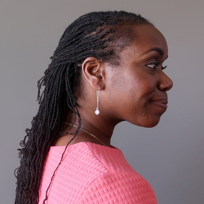 bridget of satin crystals wearing faceted rose quartz on hammered sterling silver earrings